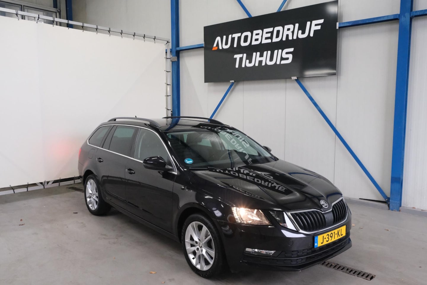 Skoda Octavia Combi - 1.0 TSI Greentech Business Edition - N.A.P. Airco, Cruise, PDC, Navi, Trekhaak. - AutoWereld.nl