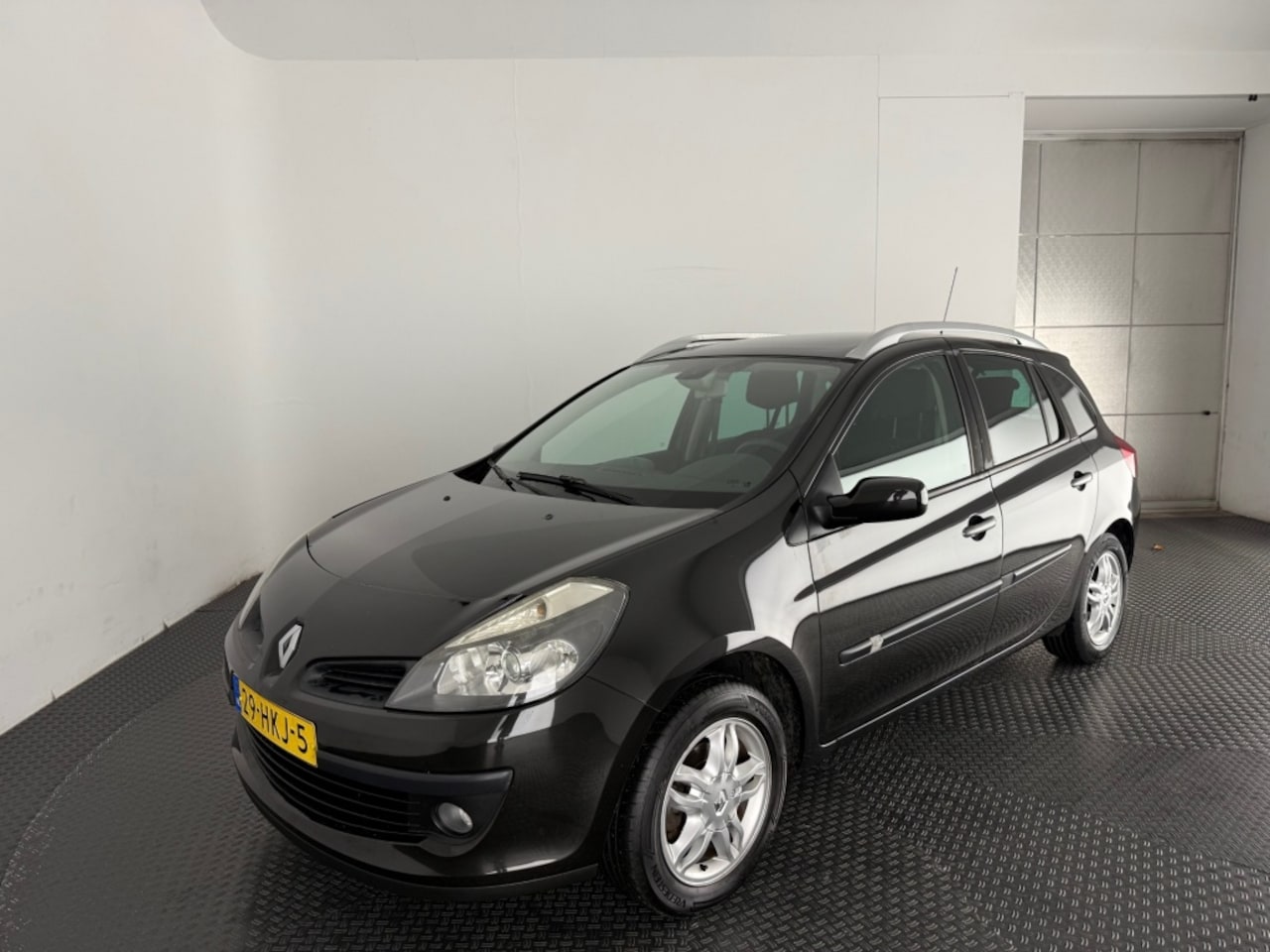 Renault Clio Estate - 1.2 TCE Business Sport panoramsich dak/cruise/climate/trekhaak/p - AutoWereld.nl
