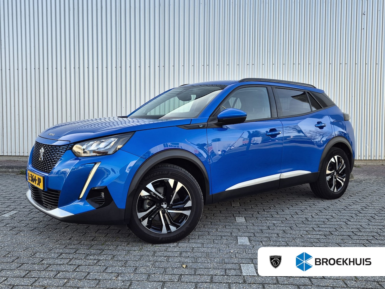 Peugeot e-2008 - EV Blue Lease Allure 50 kWh | Camera | Cruise Control | Navigatie | Apple Carplay / Androi - AutoWereld.nl