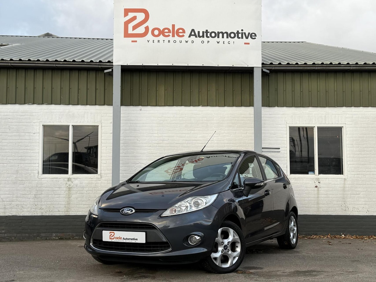 Ford Fiesta - 1.25 Titanium 5-Drs. / 2e Eig. / Cruise / Distributie V.V. / Clima / PDC - AutoWereld.nl