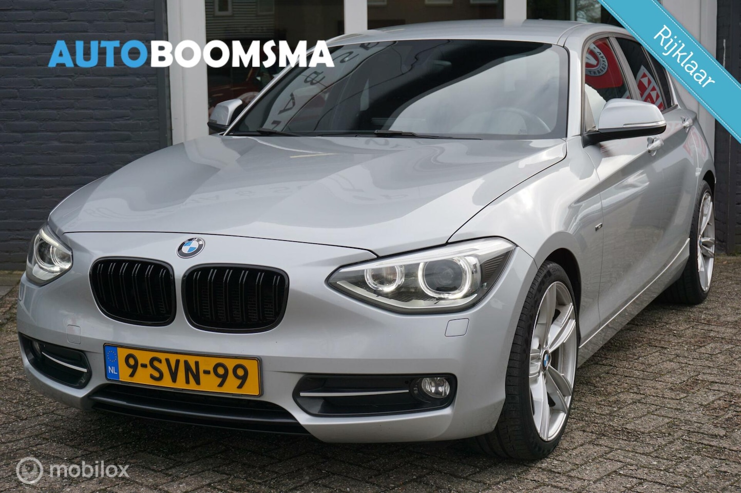 BMW 1-serie - 114i 185pk 5drs Sport Navi Clima Cruise 18" Led - AutoWereld.nl