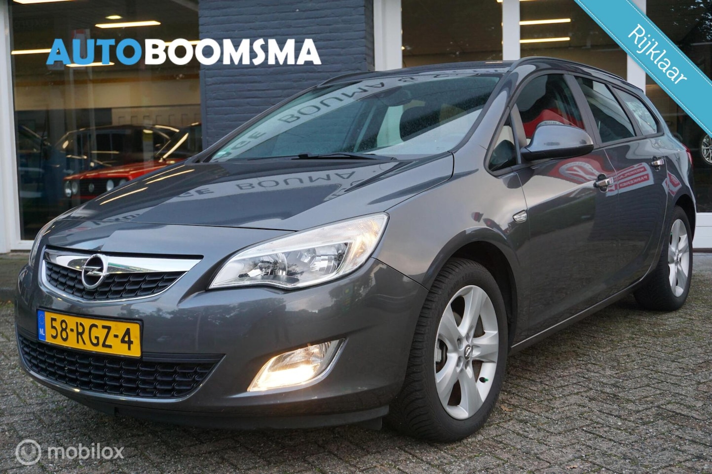 Opel Astra Sports Tourer - 1.4 T 120pk Airco Cruise Trekhaak - AutoWereld.nl