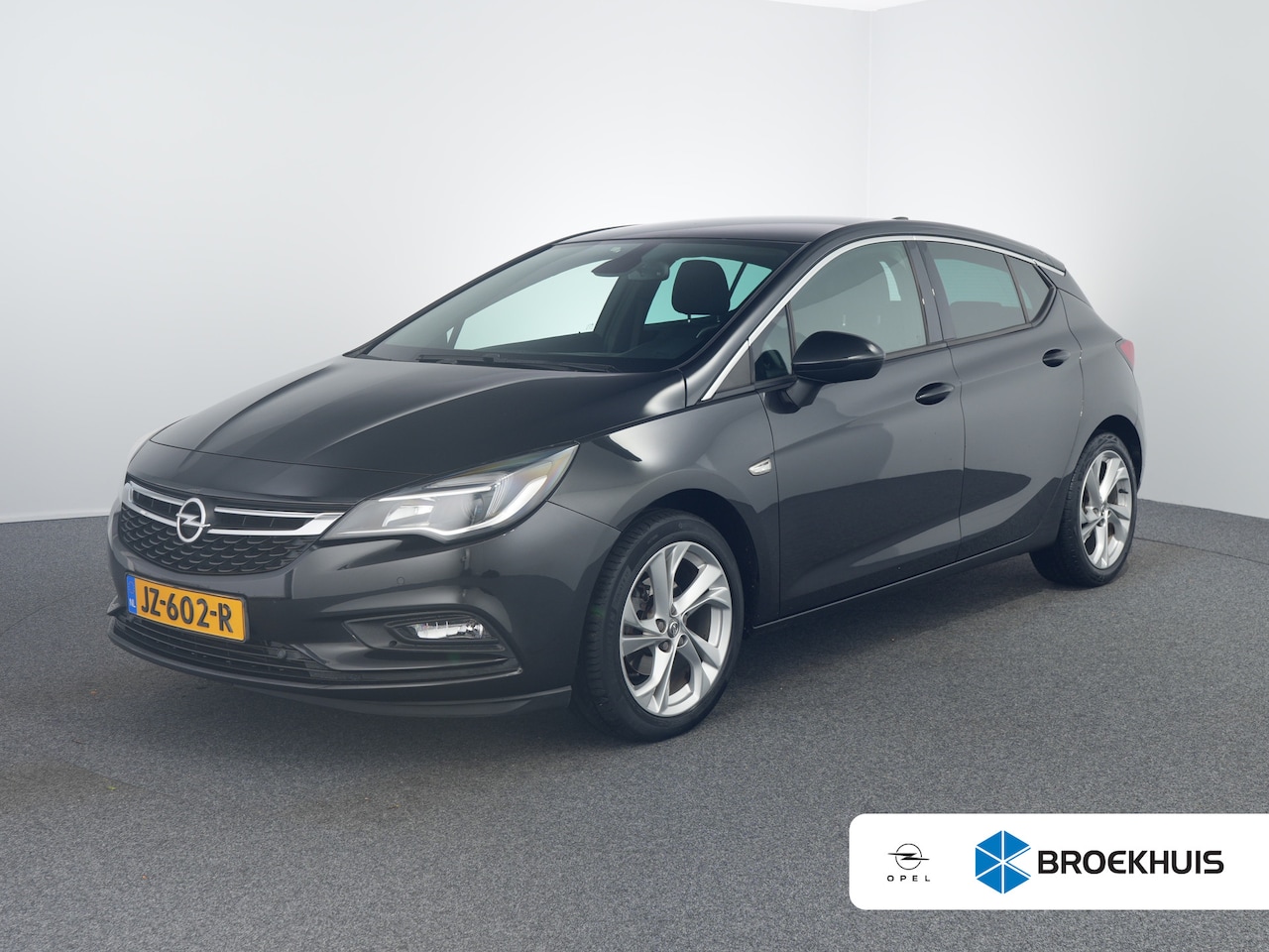 Opel Astra - 1.4 Business+ | Achteruitrijcamera | Stuurwiel verwarmd | Trekhaak (afneembaar) - AutoWereld.nl