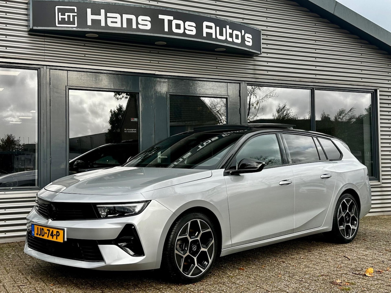 Opel Astra Sports Tourer - 1.2 Turbo 130pk AUT8 Ultimate Panorama/ Winterpakket /360 camera - AutoWereld.nl