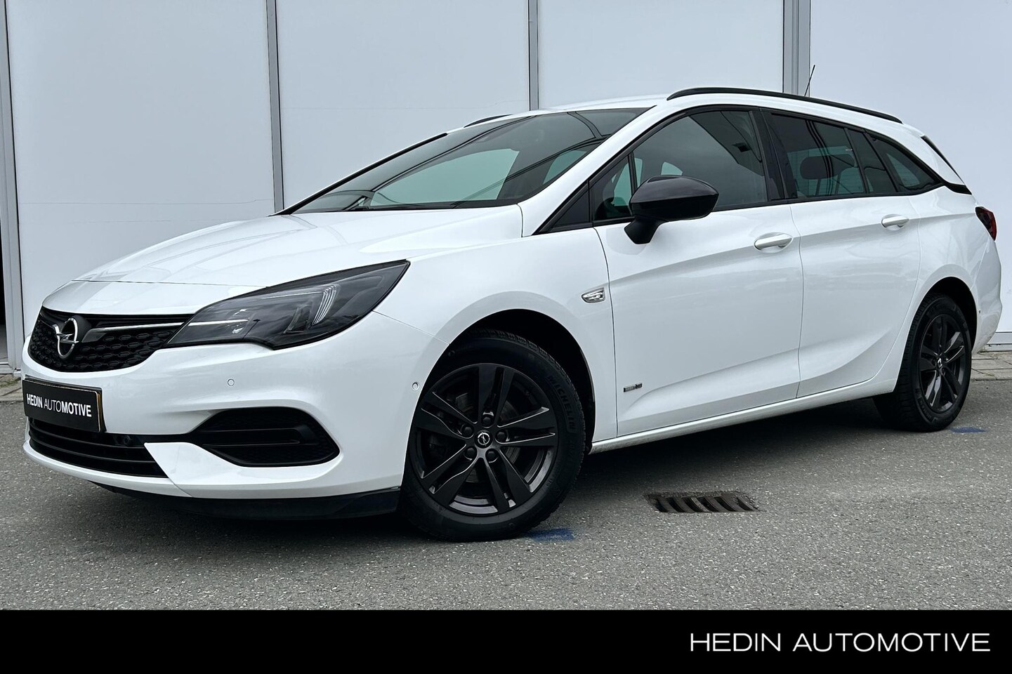 Opel Astra Sports Tourer - 1.2 110pk Design & Tech | Navigatie | Camera | Cruise Control | Climate Control | Carplay - AutoWereld.nl