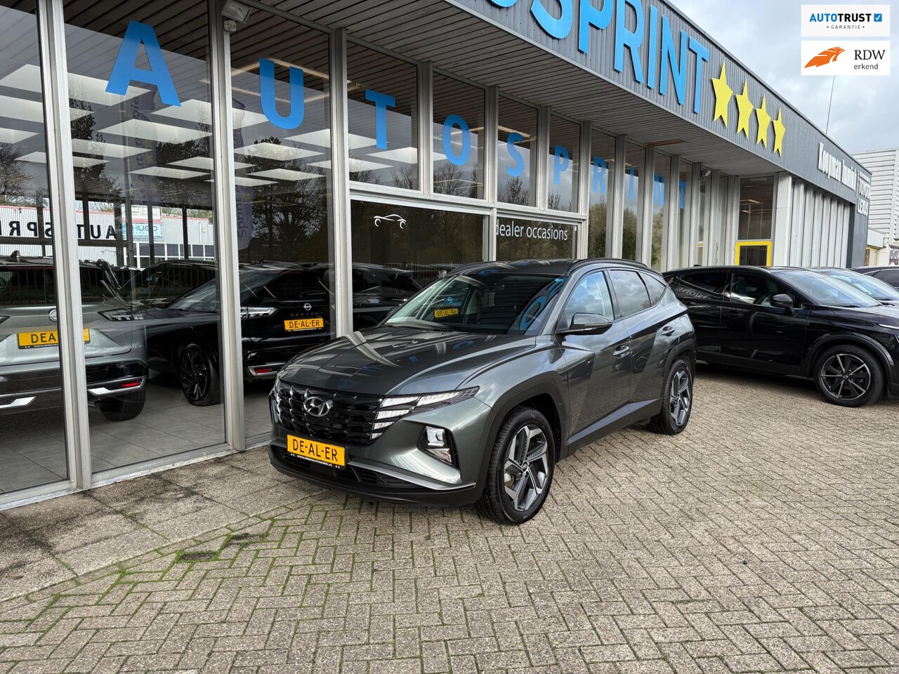 Hyundai Tucson - 1.6 T-GDI PHEV Comfort 4WD 265PK / ACHTERUITRIJCAMERA / CARPLAY - AutoWereld.nl