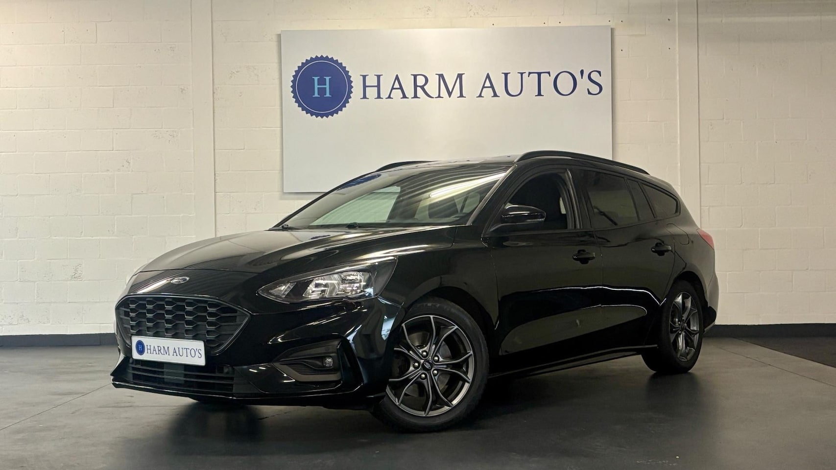 Ford Focus Wagon - 1.0 EcoBoost ST Line 125pk Navi / CAM / LED / Cruise / Clima - AutoWereld.nl