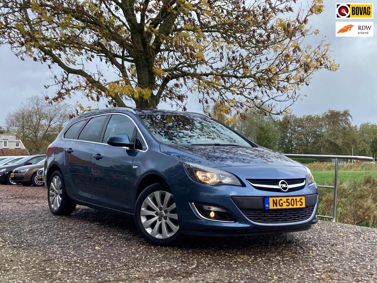 Opel Astra Sports Tourer - 1.4 Business + | Navi + Clima + Cruise nu €6.750,-!! - AutoWereld.nl