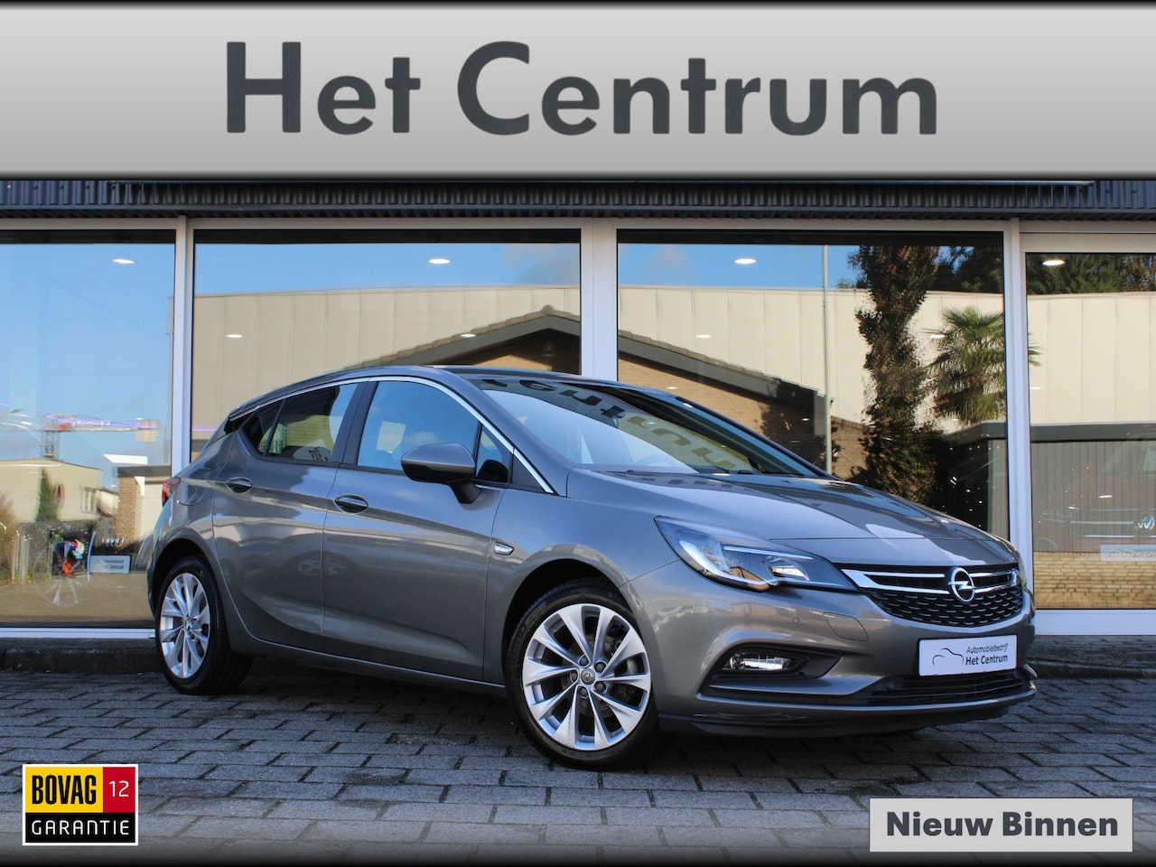 Opel Astra - 1.4 150PK Automaat Business+ / Navigatie / Licht metalen velgen / 32.951 KM!!!! - AutoWereld.nl