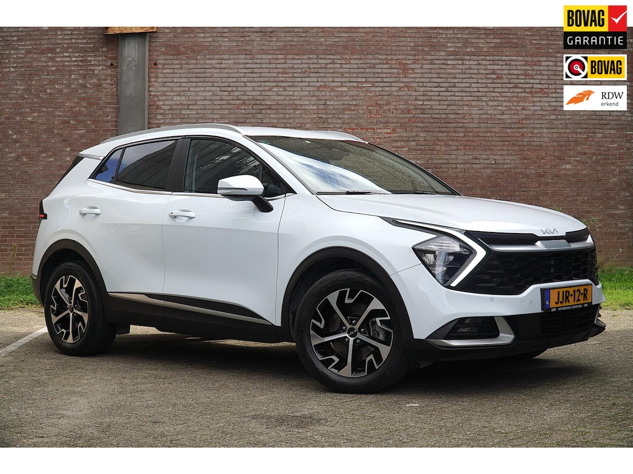Kia Sportage - 1.6 T-GDi Hybrid DynamicLine 1.6 T-GDi Hybrid DynamicLine 180PK, Climat-en Cruise Control, Camera, Apple Carplay. - AutoWereld.nl