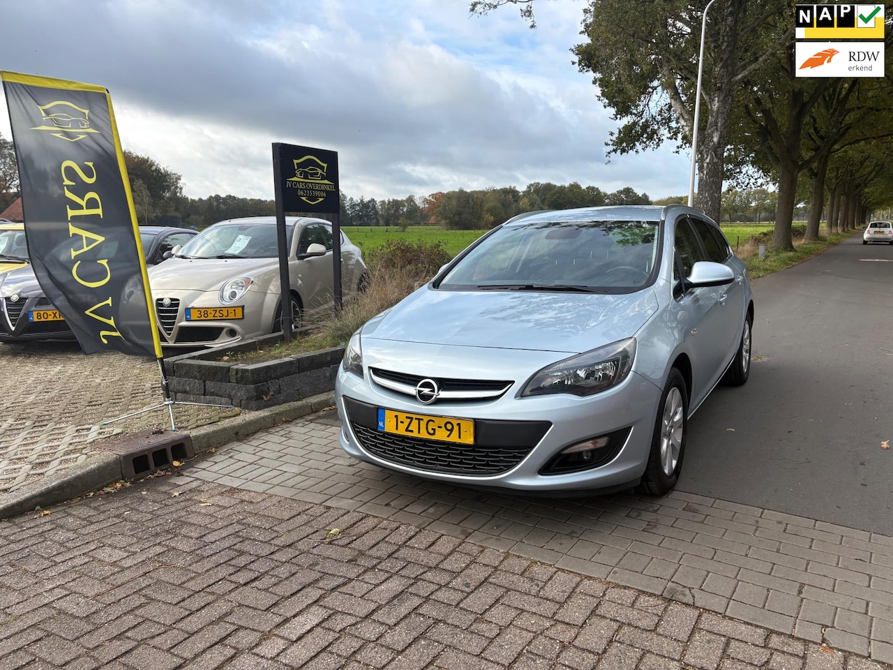 Opel Astra Sports Tourer - 1.4 Turbo Edition 1.4 Turbo Edition,AIRCO,APPLE CARPLAY,GROOT SCHERM,6BAK,PDC,ELEKT PAKKET,TREKHAAK,SPORTVEL - AutoWereld.nl