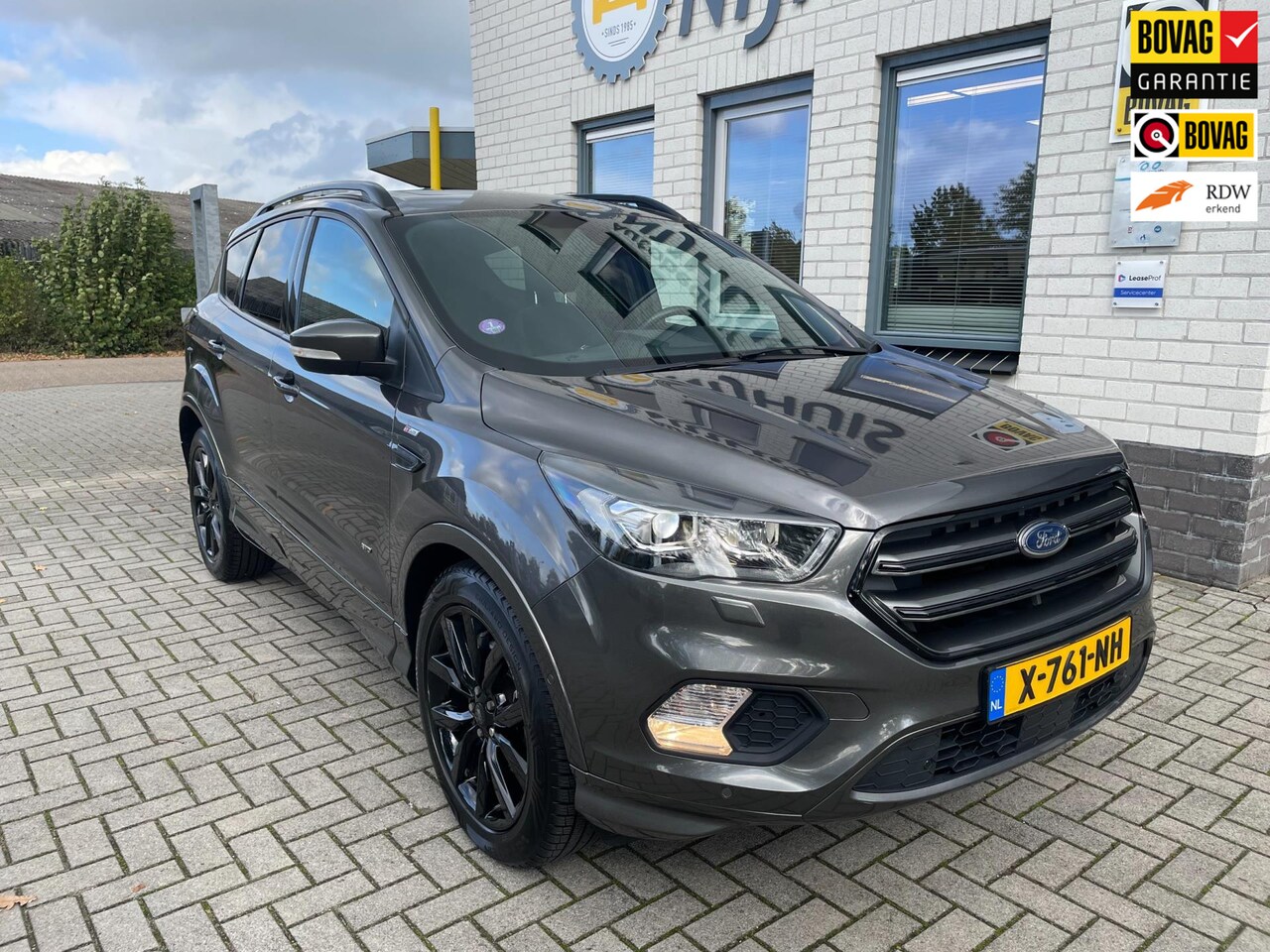 Ford Kuga - 1.5 Titanium 4WD / Cruise controle / Climate Controle / Telefoon / Navigatie / Camera / PD - AutoWereld.nl