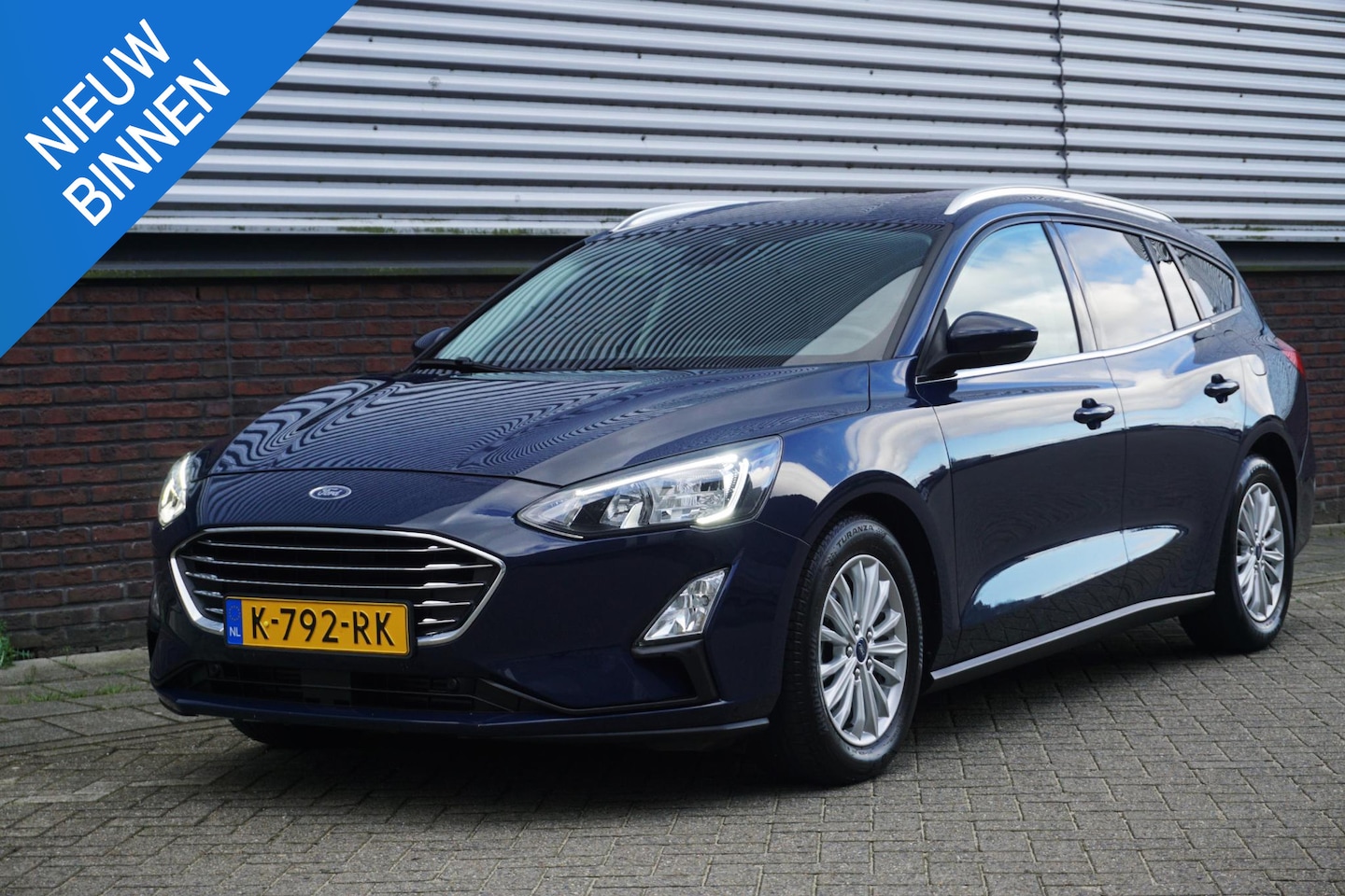 Ford Focus Wagon - 1.0 EcoB.125PK Hybrid Titanium X Bus./Trekhaak/ Winter+Technologypack. - AutoWereld.nl