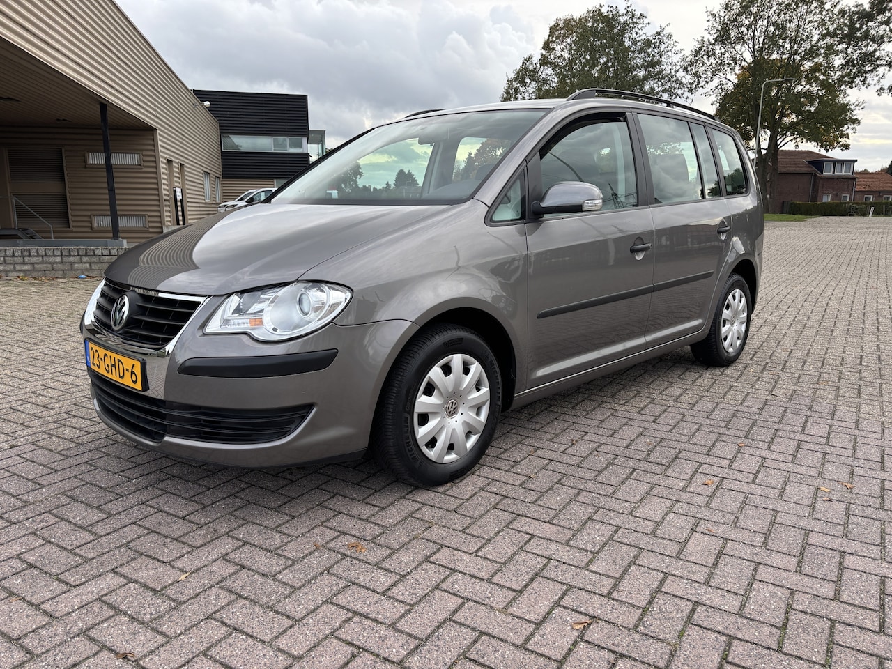 Volkswagen Touran - 1.4 TSI Optive Automaat [ airco,audio,cruise,pdc ] - AutoWereld.nl