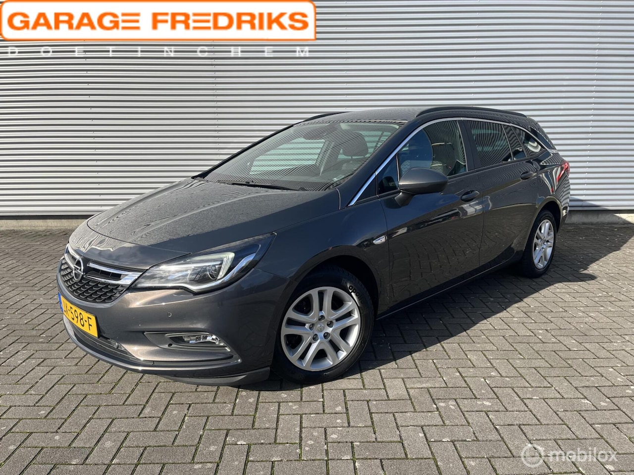 Opel Astra Sports Tourer - 1.6 CDTI Business+ | Parkeersensoren | Navi | - AutoWereld.nl