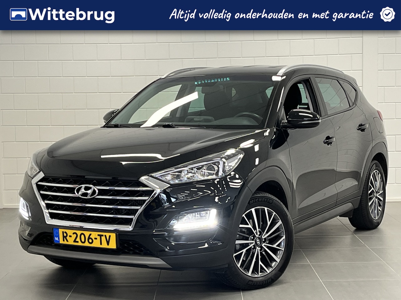 Hyundai Tucson - 1.6 T-GDI Comfort AUTOMAAT! | NAVIGATIE | TREKHAAK | PARKEERCAMERA | DEALER ONDERHOUDEN! - AutoWereld.nl