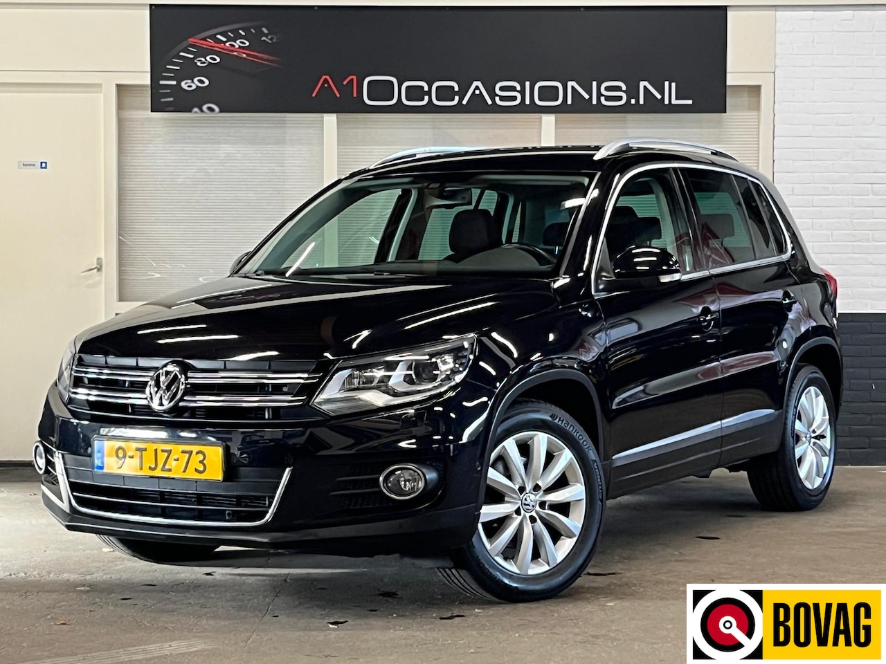 Volkswagen Tiguan - 1.4 TSI Sport&Style + STOELVERWARMING + AUTOMAAT - AutoWereld.nl