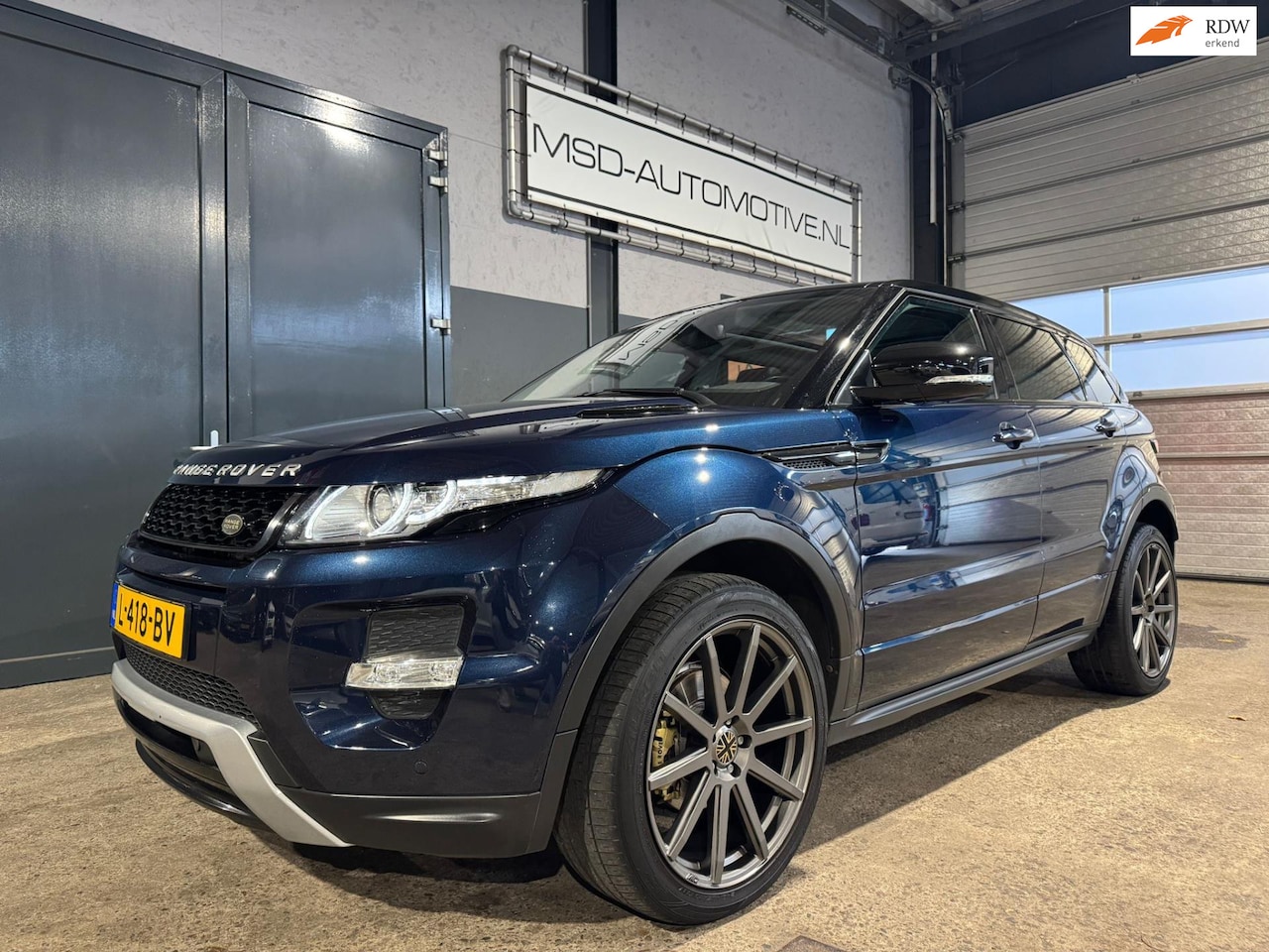 Land Rover Range Rover Evoque - 2.0 Si 4WD Pure Trekhaak Panoramadak - AutoWereld.nl