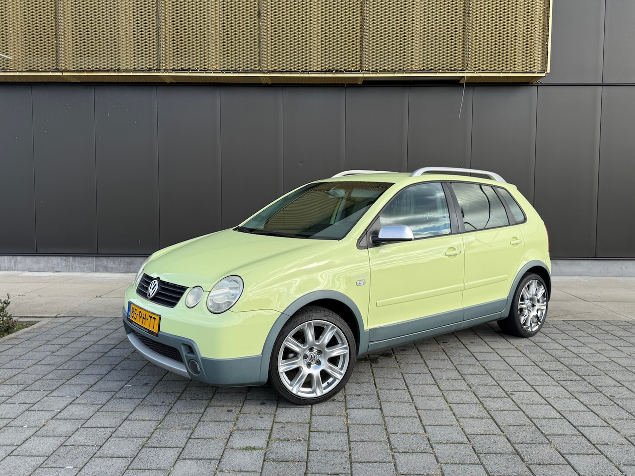Volkswagen Polo - 1.4-16V FUN Cross | Airco | Cruise | LM velgen | Elektr ramen | Dakdrag - AutoWereld.nl