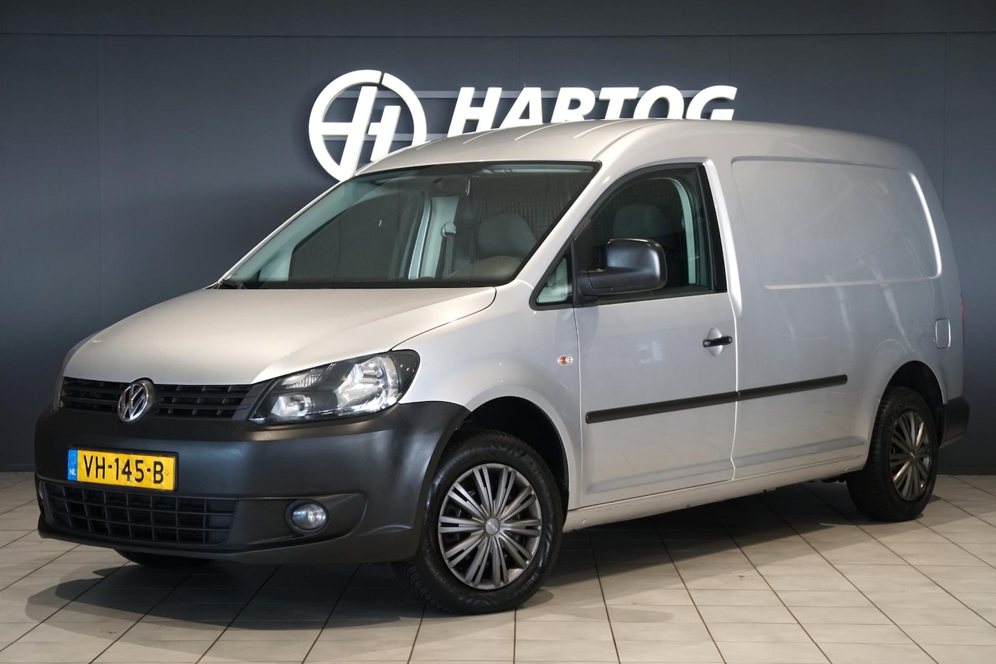 Volkswagen Caddy Maxi - 1.6 TDI *EERSTE EIGENAAR* + AIRCO / TREKHAAK - AutoWereld.nl
