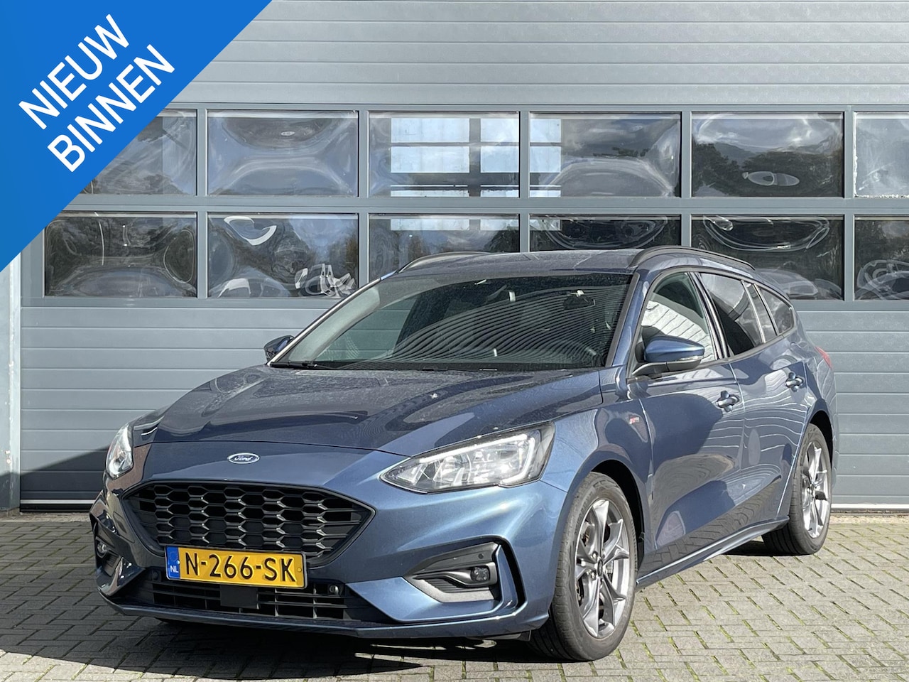 Ford Focus Wagon - 1.0 HYBRID ST LINE BUSINESS I WINTERPAKKET I P-CAMERA I APPLE CARPLAY I CRUISE CONTROL - AutoWereld.nl