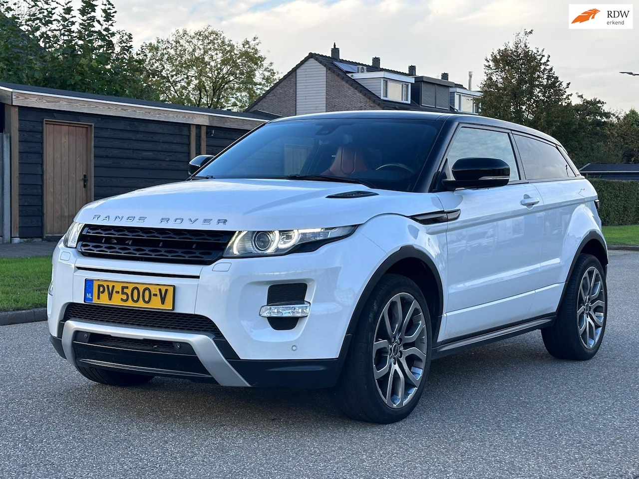 Land Rover Range Rover Evoque Coupé - 2.0 Si 4WD Prestige Automaat*Leder*Navigatie*Cruise*Clima*Achteruit Camera**LM velgen*Park - AutoWereld.nl