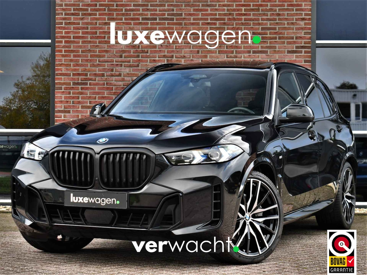 BMW X5 - xDrive50e M-Sport Skylounge Comf-stoel ACC 360 HUD H/K 22inch - AutoWereld.nl