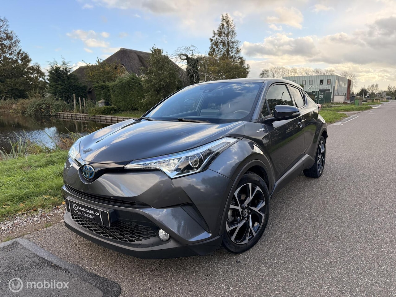 Toyota C-HR - 1.8 Hybrid Dynamic Sport / ACC / Navi / Stuurver - AutoWereld.nl