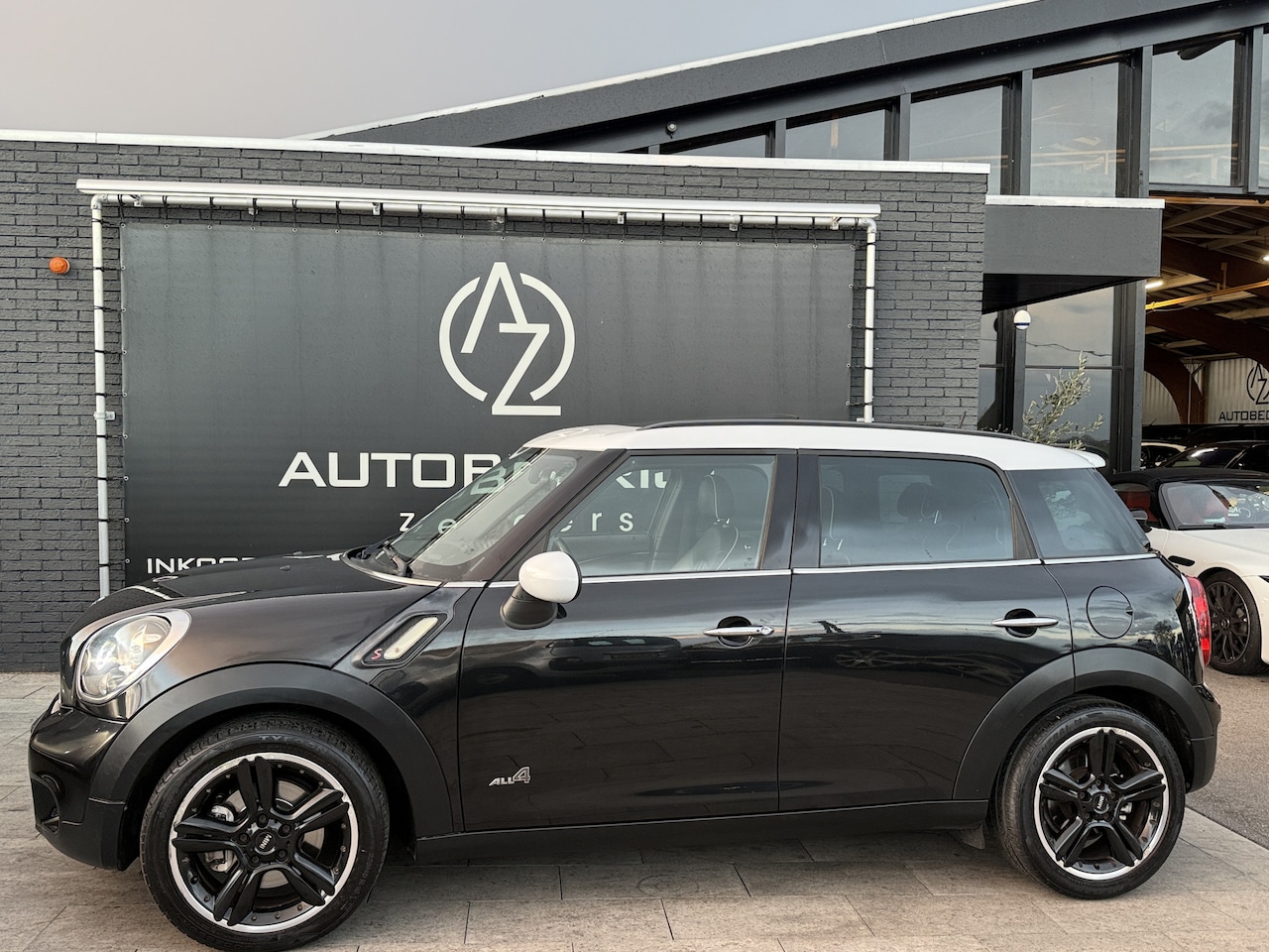 MINI Countryman - 1.6 Cooper S ALL4 Chili *AUTOMAAT* - AutoWereld.nl