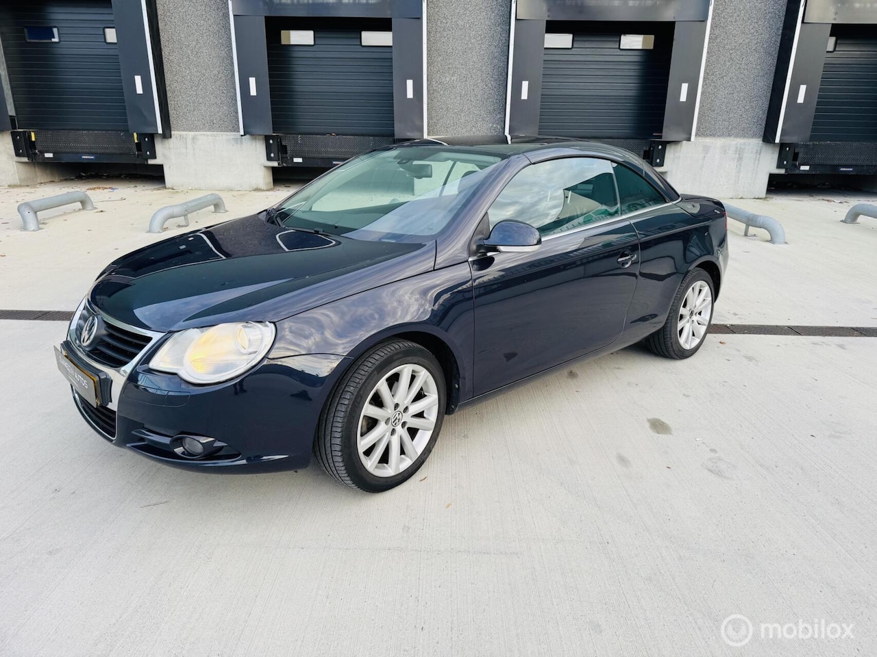 Volkswagen Eos - 2.0 Cabrio Hardtop Leer Trekhaak Cruise - AutoWereld.nl