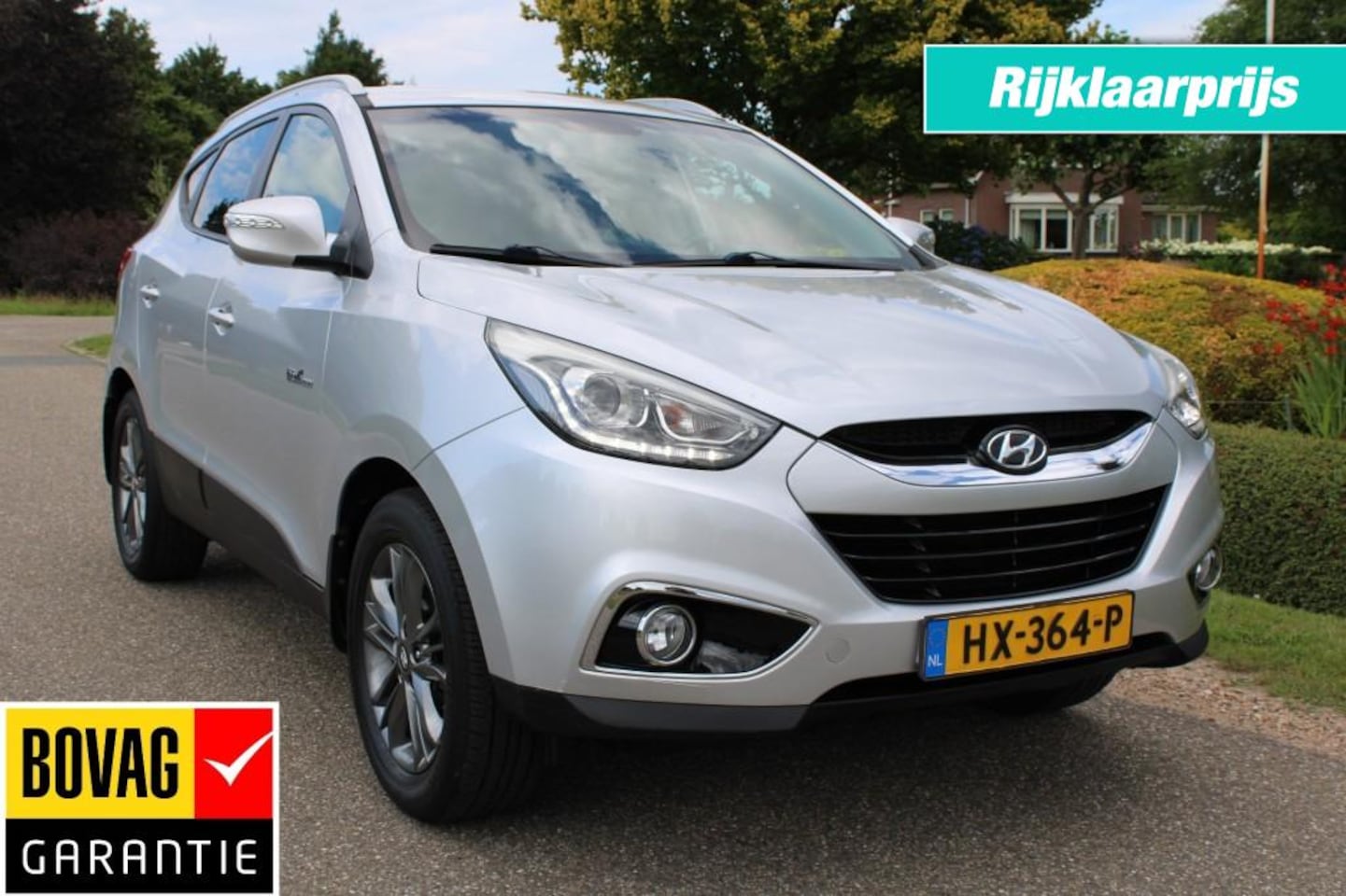 Hyundai ix35 - 1.6I GDI 135pk GO! ECC/cruise/navi/half leer/camera/trekhaak - AutoWereld.nl