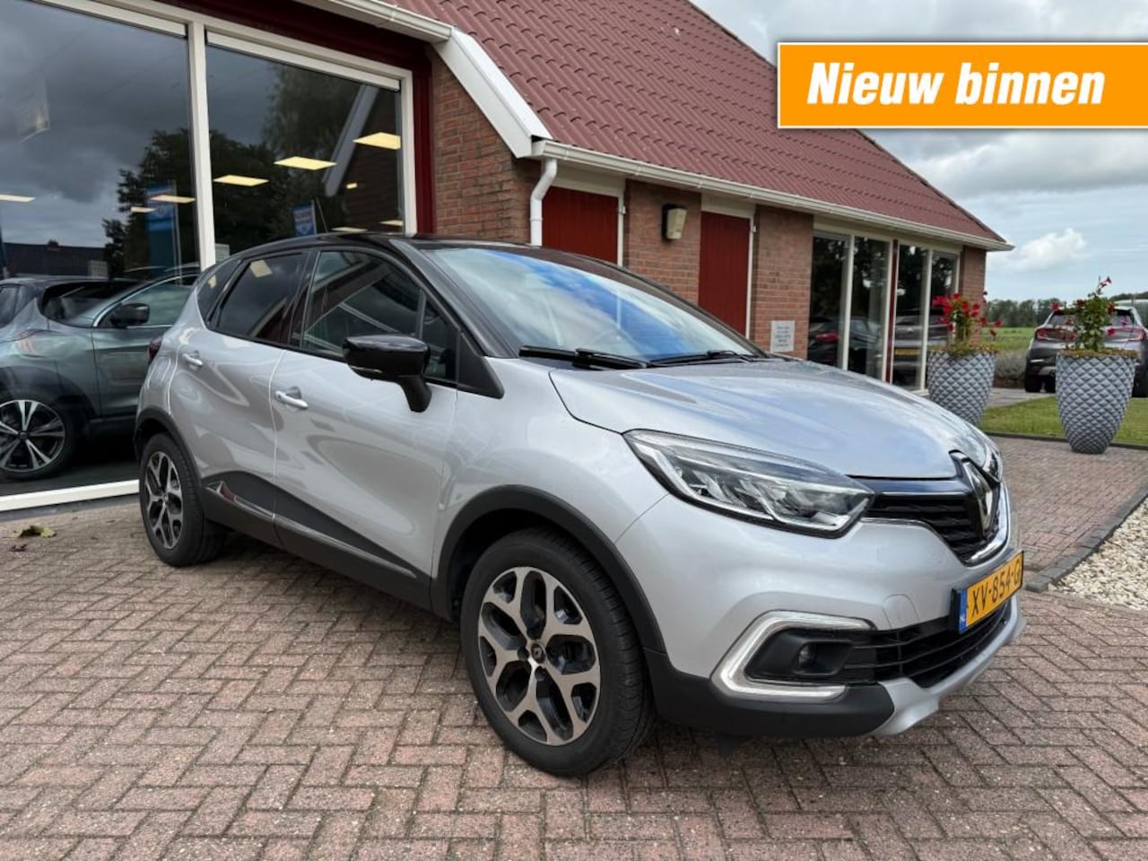 Renault Captur - 0.9 TCE INTENS AIRCO/NAVIGATIE/ECC/PDC/HOGE ZITen HOGE INSTAP - AutoWereld.nl