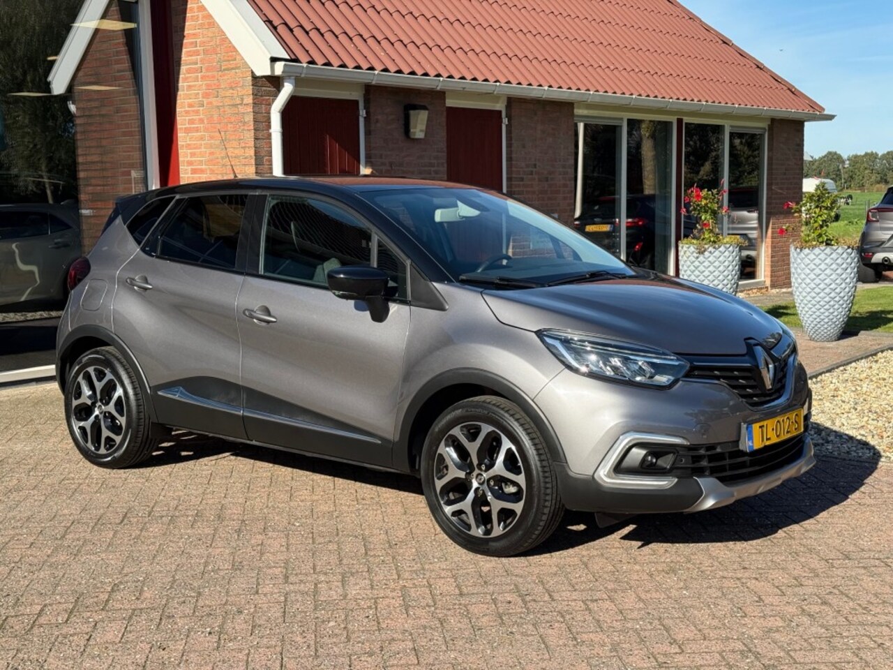 Renault Captur - 0.9 TCE INTENS AIRCO/NAVIGATIE/ECC/PDC/HOGE ZITen HOGE INSTAP - AutoWereld.nl