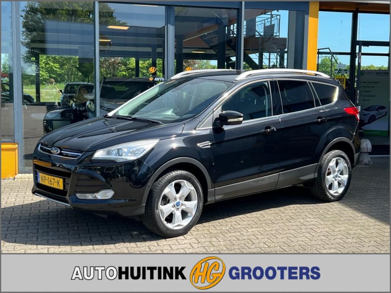 Ford Kuga - 1.6 Titanium 4WD - sensoren - trekhaak - AutoWereld.nl