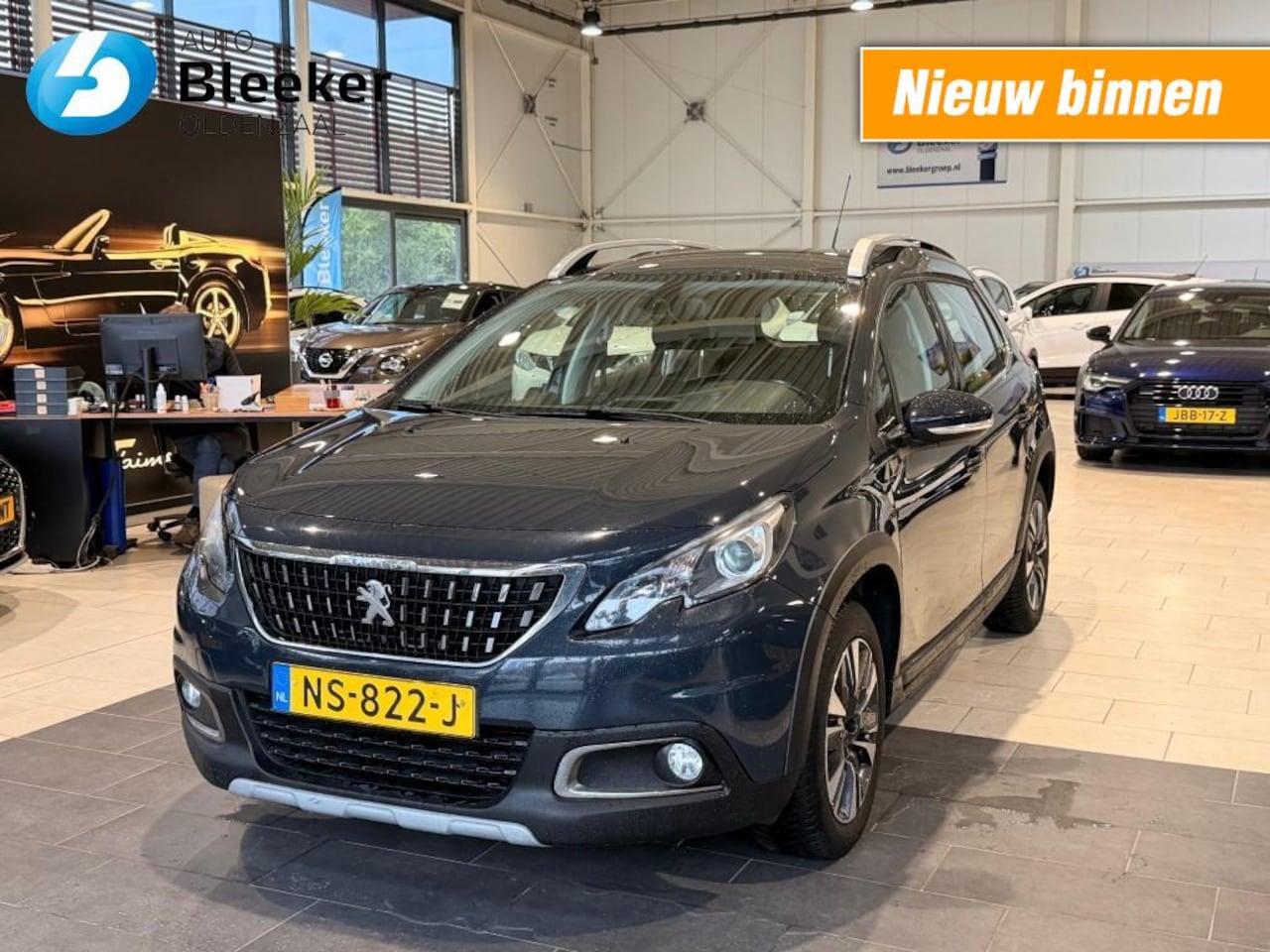 Peugeot 2008 - 1.2 Puret Allure Airco 1/2 Leer Navi Cruise distributie vervangen - AutoWereld.nl