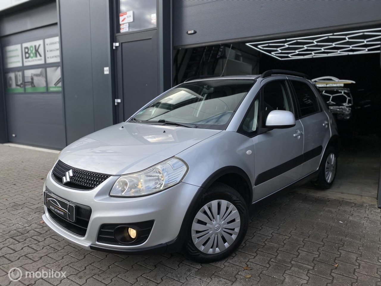 Suzuki Swift - 1.2 Exclusive |AIRCO|STOELVERWARMING|PDC|NAP! - AutoWereld.nl