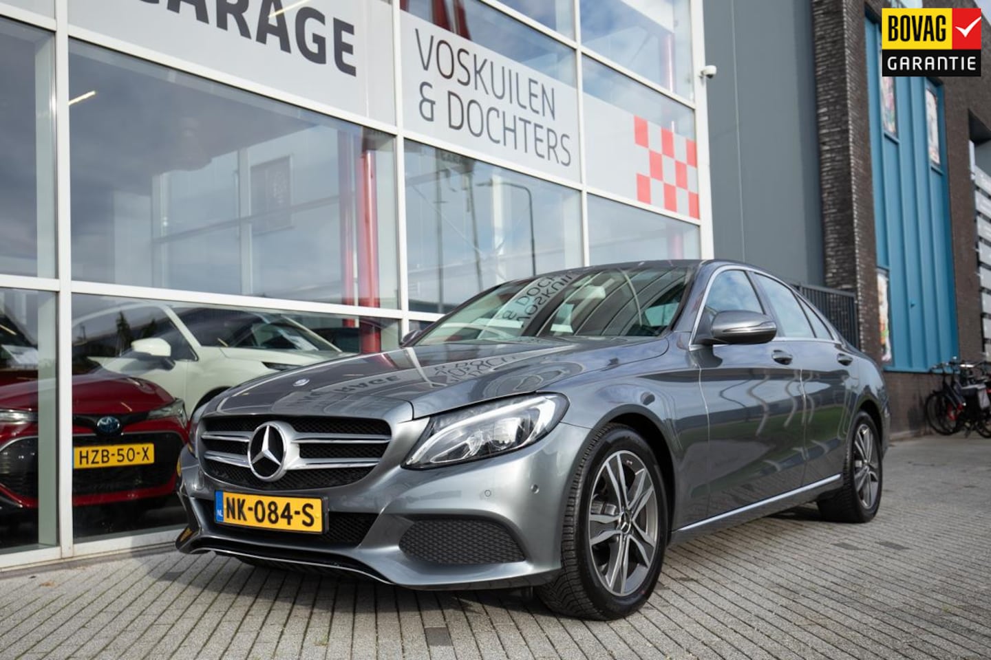 Mercedes-Benz C-klasse - 180 Lease Edition | Navigatie | Elektrische stoelen - AutoWereld.nl