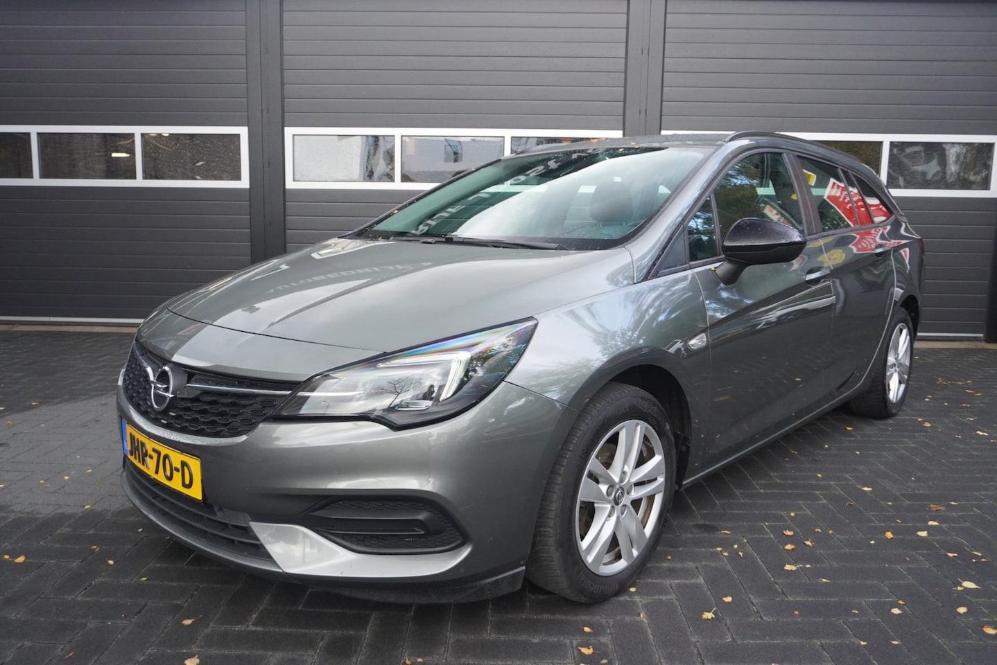 Opel Astra Sports Tourer - 1.2 Airco/Cruise/Navi/Park.sensoren - AutoWereld.nl