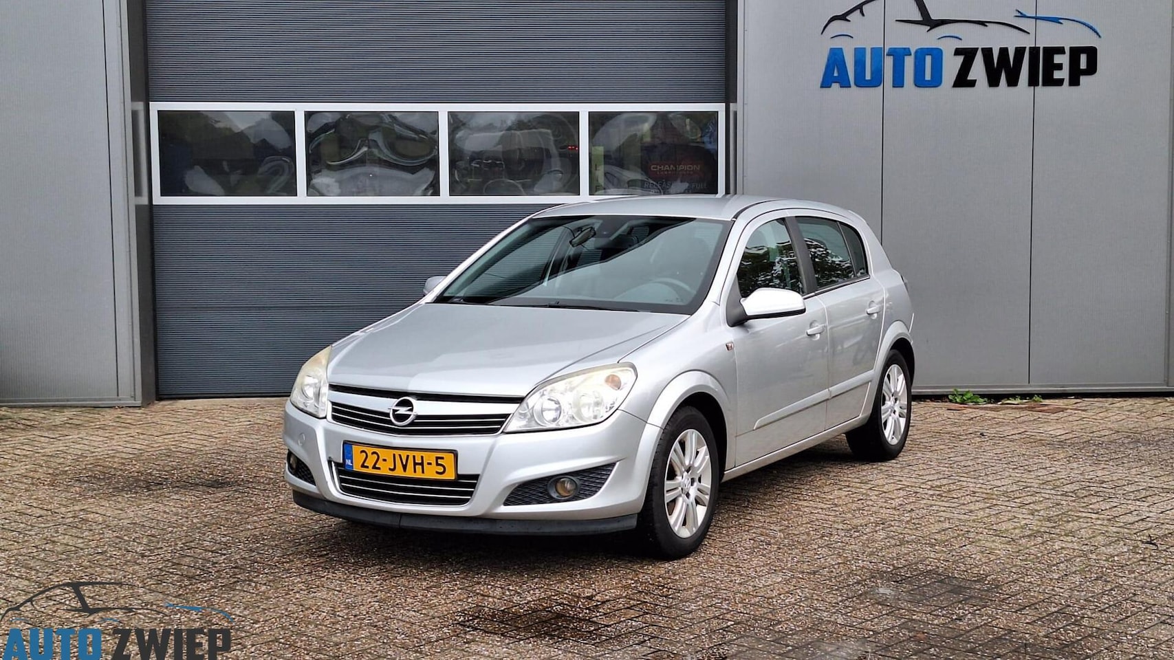 Opel Astra - 1.6 Cosmo Stoelverwarming/Navi/Airco - AutoWereld.nl