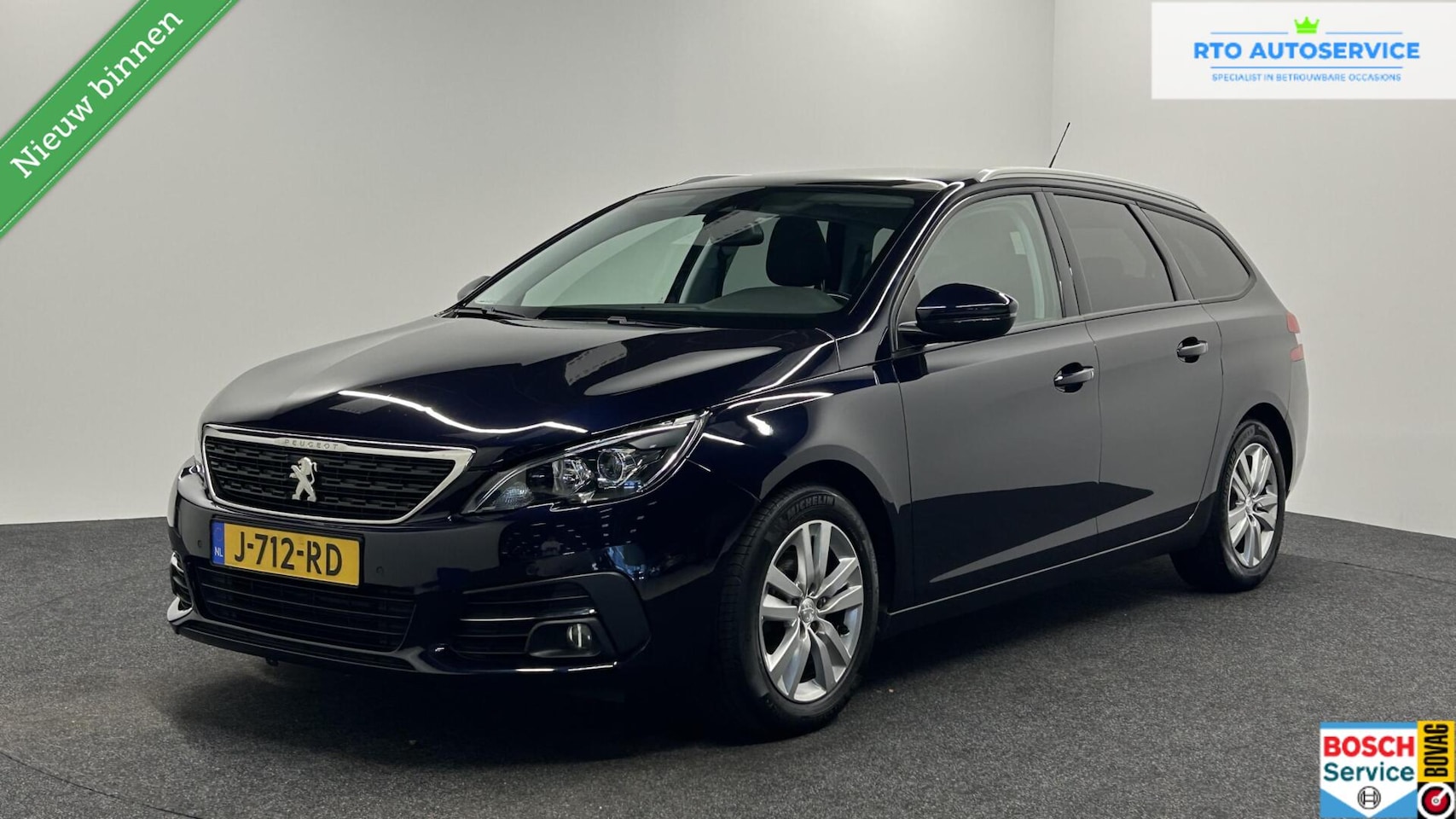 Peugeot 308 SW - 1.2 PureTech Blue Lease Allure LM PANO CRUISE CARPLAY NAVIGATIE. - AutoWereld.nl