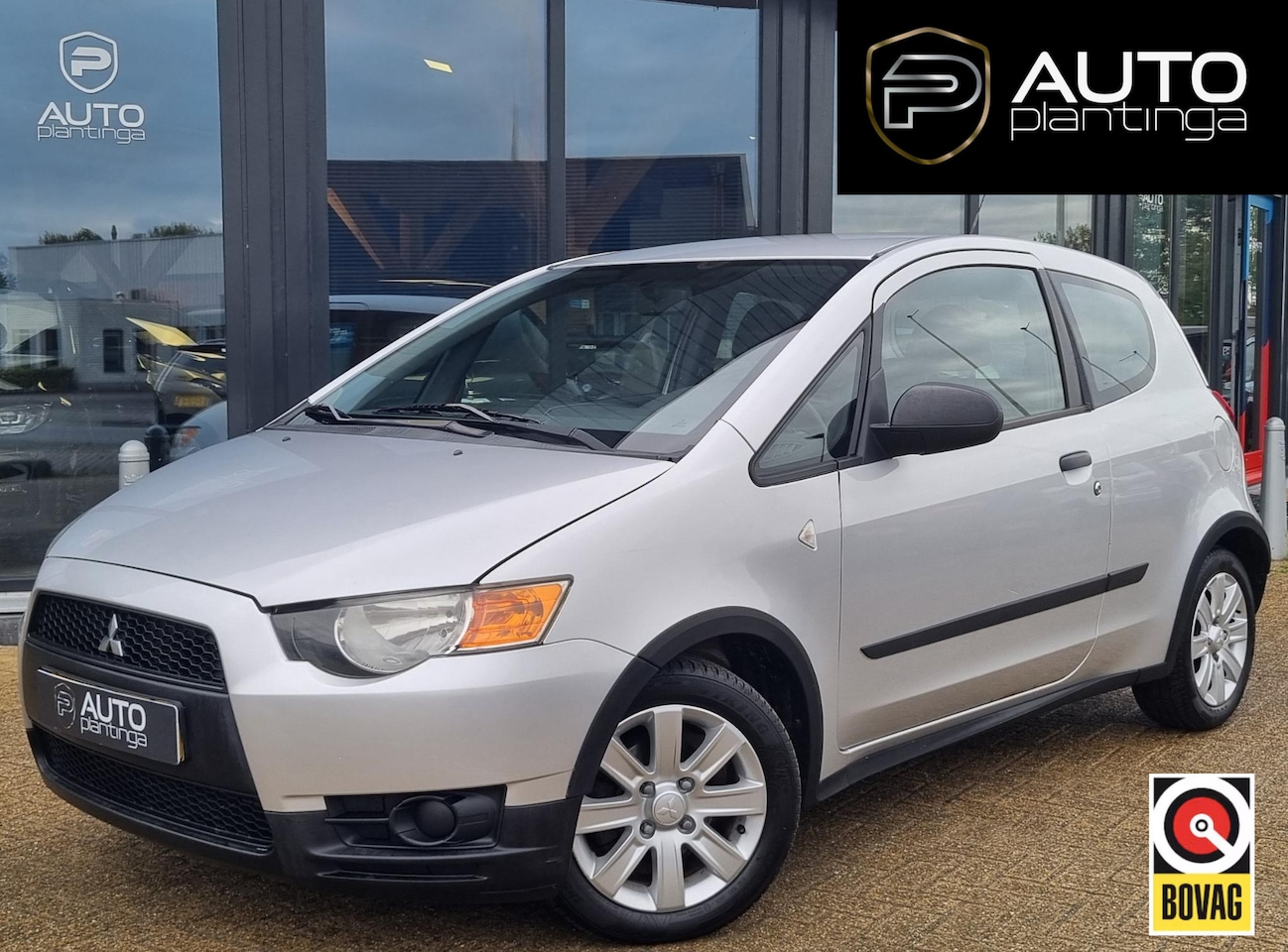 Mitsubishi Colt - 1.1 Edition One 75PK | Zeer Nette Staat | Volledige Onderhoudshistorie | Airco | Leder Stu - AutoWereld.nl
