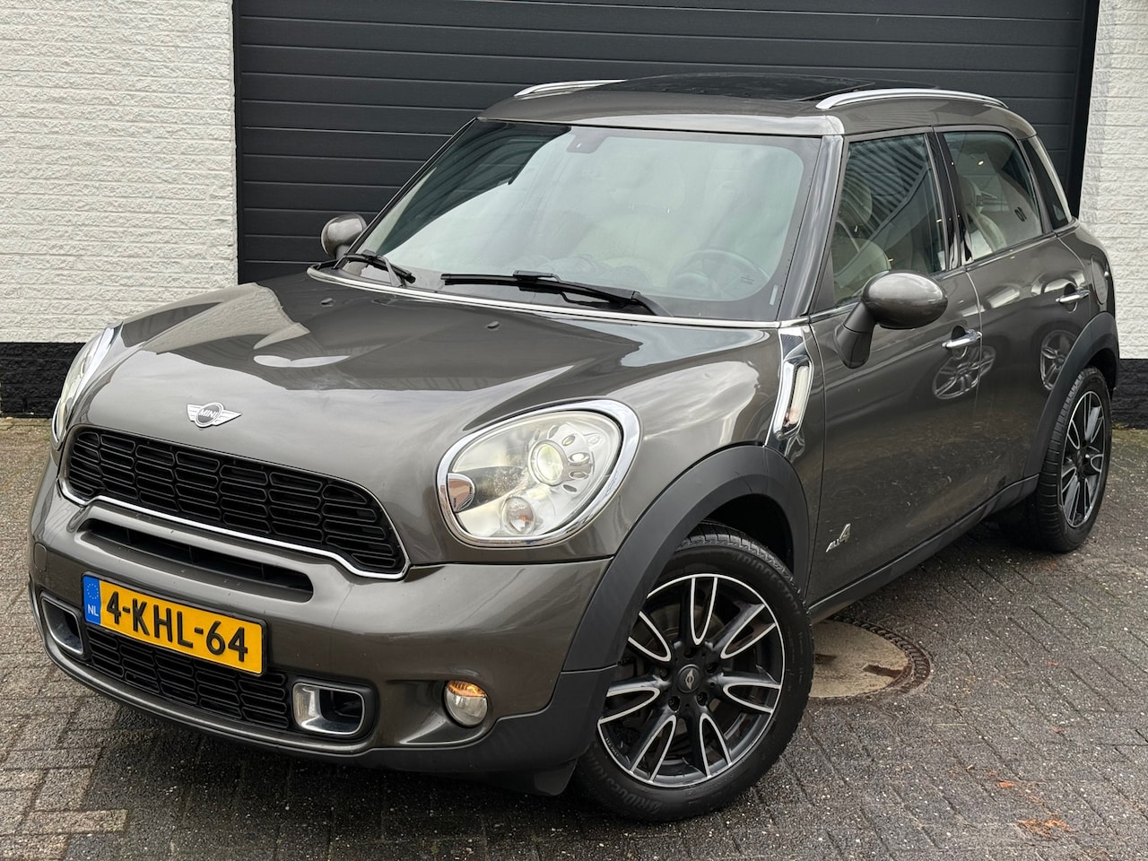 MINI Countryman - Mini 1.6 Cooper S ALL4 Chili | 184 pk |Pano| Leder | Xenon | Handgeschakeld | NAP | 4WD - AutoWereld.nl