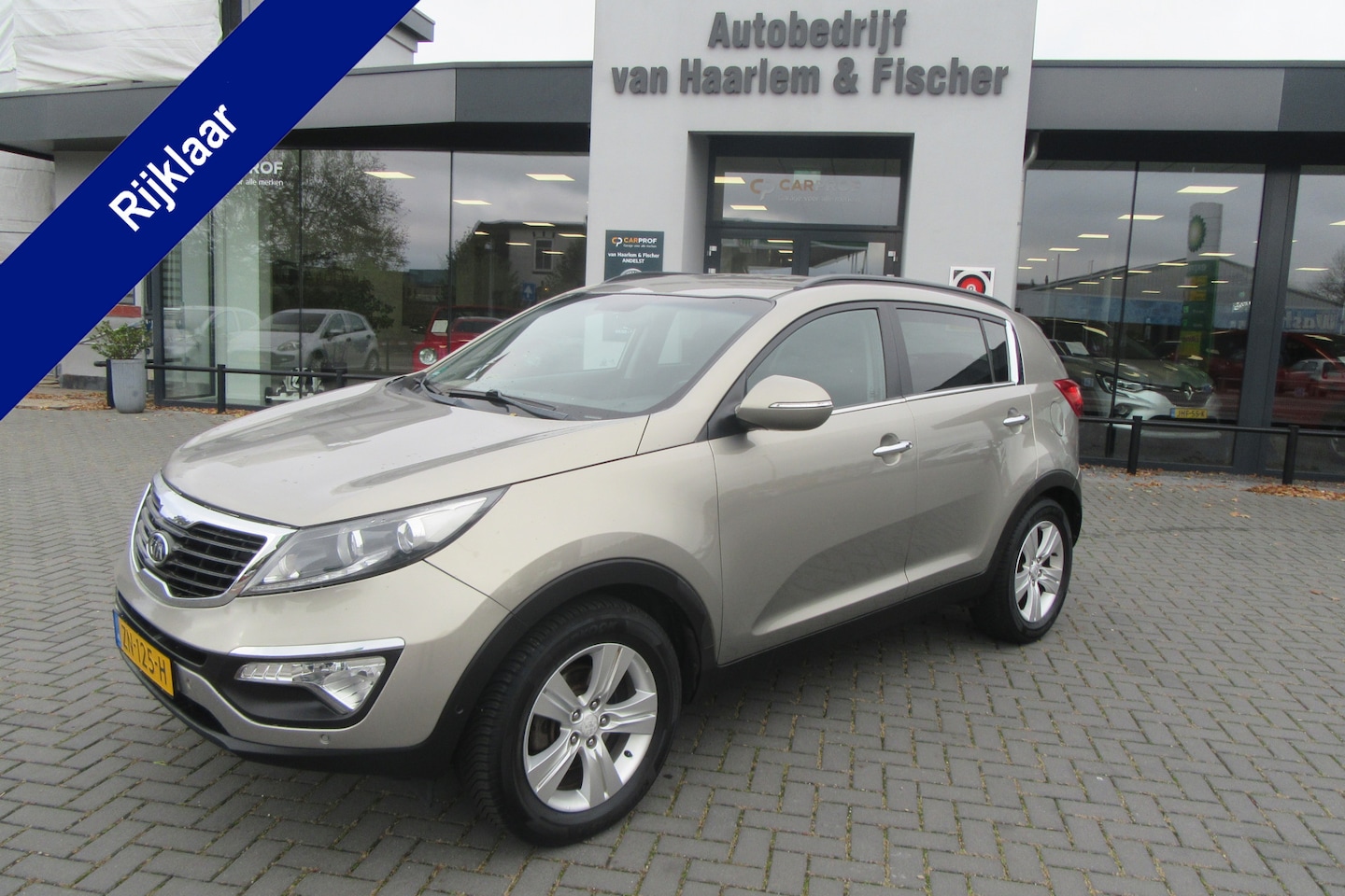 Kia Sportage - 1.7 CRDI Super Pack 1.7 CRDI Super Pack, Navi, Camera, 4 Seizoenen banden - AutoWereld.nl