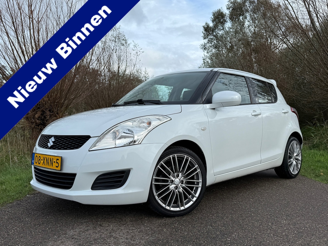 Suzuki Swift - 1.2 Summer EASSS / Navi / Airco / Stoelverwarming / 17" Velgen / AUX/12V / BTW-auto / - AutoWereld.nl