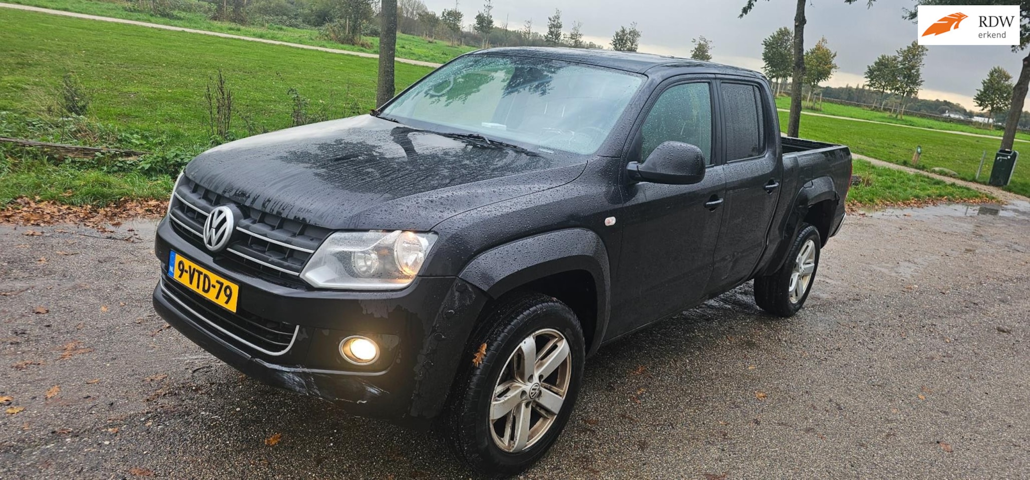 Volkswagen Amarok - 2.0 TDI 4Motion DC Highline lang lage kms - AutoWereld.nl