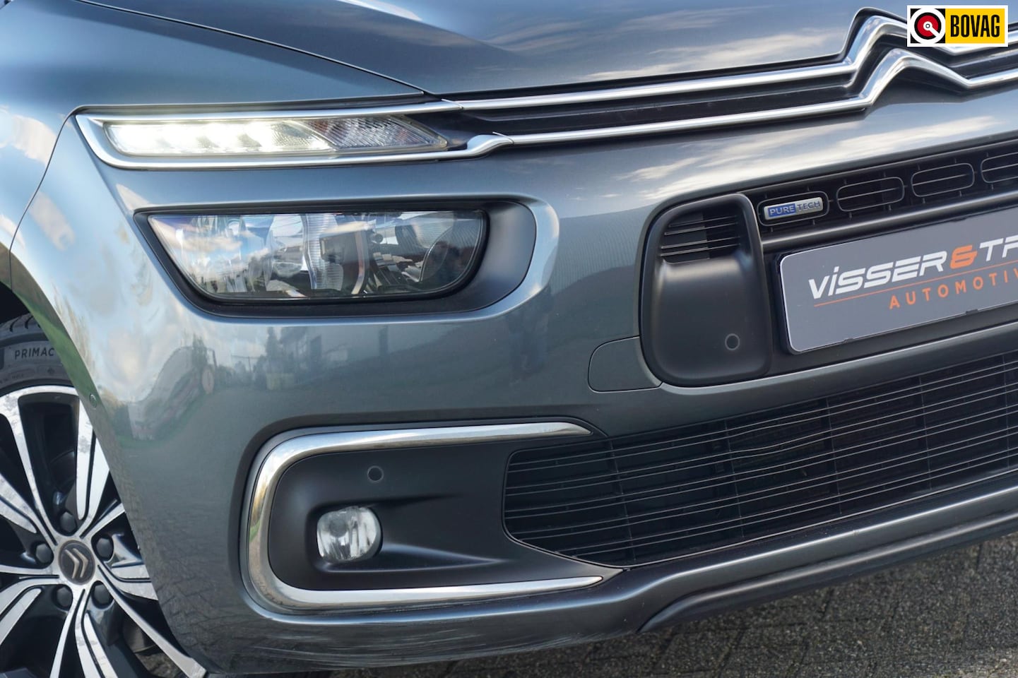 Citroën Grand C4 Picasso - 1.2 PureTech 130pk 7persoons Business - Gris Shark - Clima/Cruise/Trkhk - AutoWereld.nl