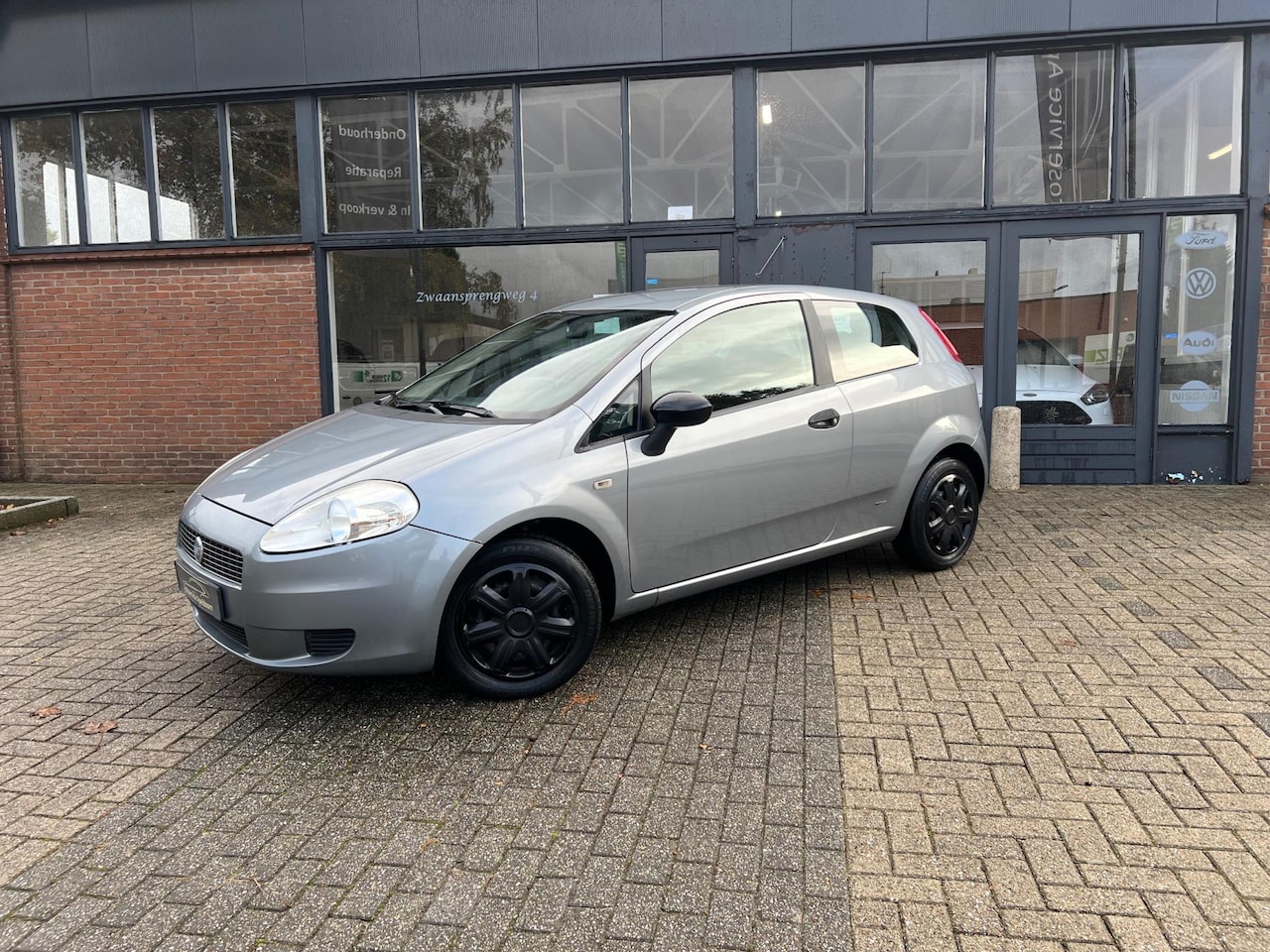 Fiat Grande Punto - 1.2 Edizione Cool 1.2 Edizione Cool, Airco - AutoWereld.nl