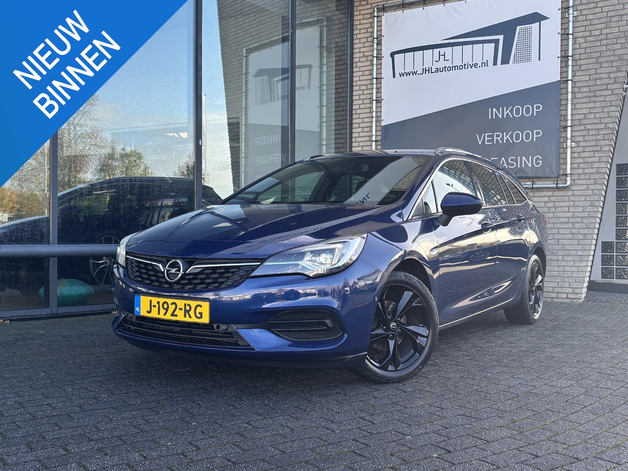 Opel Astra Sports Tourer - 1.2 Elegance*NAVI*ECC*CRUISE*HAAK*CAMERA*CARPLAY* - AutoWereld.nl