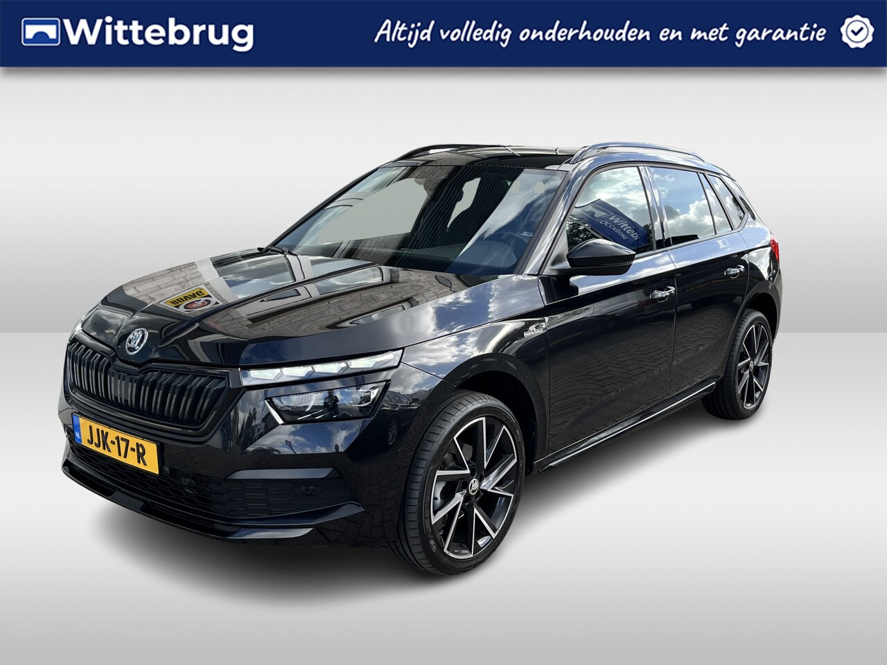 Skoda Kamiq - 1.5 TSI Monte Carlo / AUTOMAAT/ ELEKTR. TREKHAAK/ PANO/ DIGITAL DASH/ CRUISE/ LED/ PARK. S - AutoWereld.nl