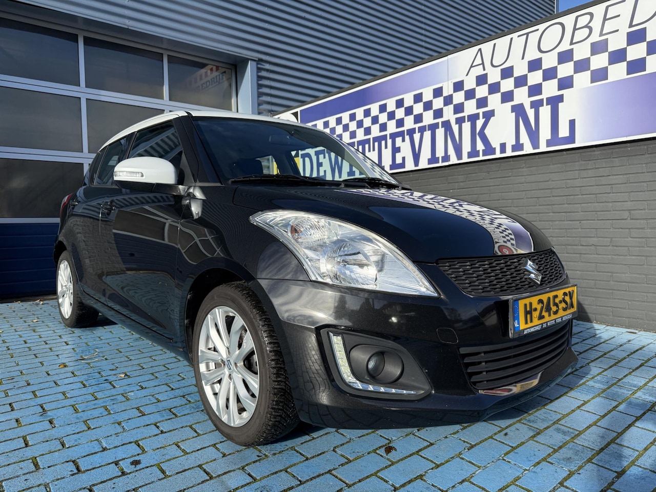 Suzuki Swift - 1.2 5DRS CRUISE AIRCO LED - AutoWereld.nl